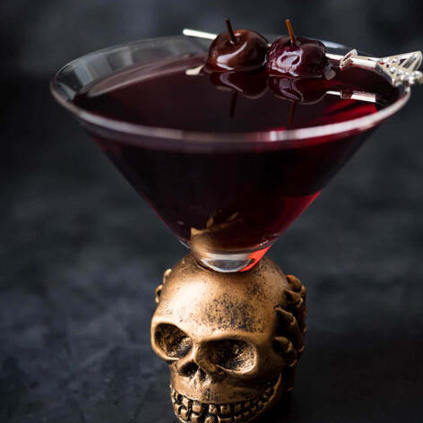 Simple yet strong, khalua, white rum, and grenadine. topped with cherries and served chilled